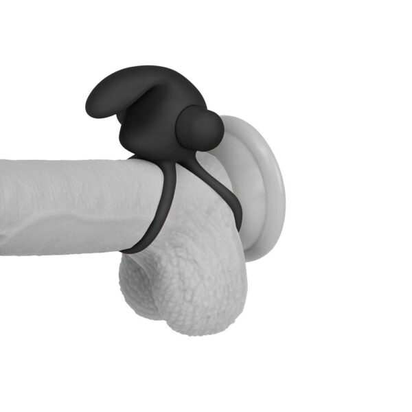 Photo of the Power Clit Duo Cockring demonstrated on a model penis