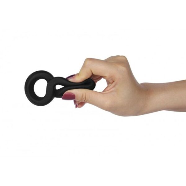 Photo of a person's hand squeezing the X-Basic Ultra Soft Silicone Cockring